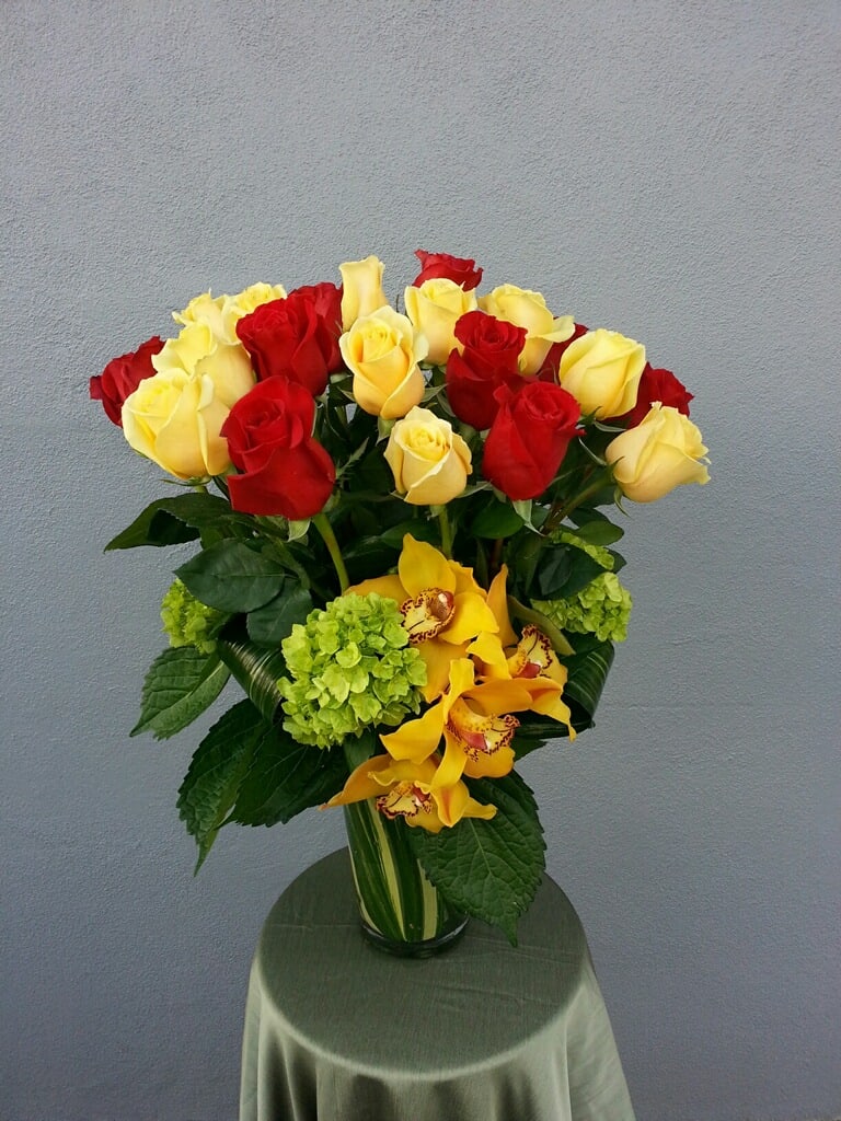 Rambling Roses -  24 Roses, Cymbidium Orchids,Hydrangea, Exotic Leaves.