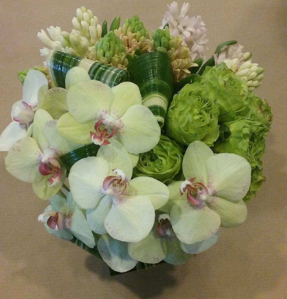 Green peridot - Hyacinth, green roses, and tropical orchids.
