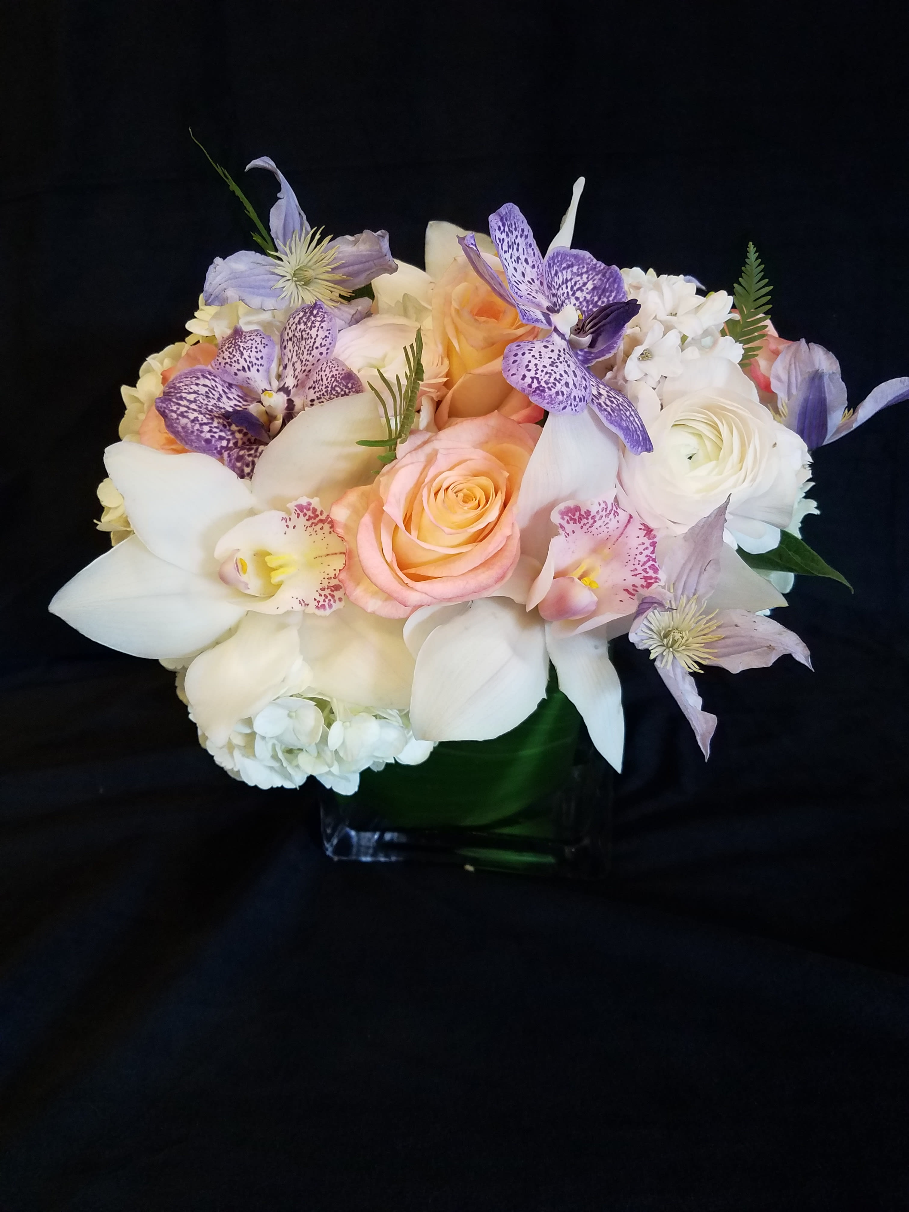 Thought of you - White hydrangea, roses cymbidium orchids and purple vanda orchids