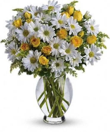 Amazing Daisy Amazing Daisy - Shower baby with love! Happy white daisies and friendly yellow spray roses make a super baby shower decoration or gift. The neutral colors are perfect for those who are waiting to find out if baby's a boy or girl! Item # T32-1A