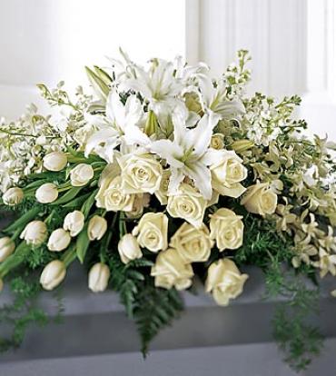 Resurrection Casket Spray Resurrection Casket Spray - An honor fit for royalty. Resplendent with all white roses, tulips, orchids, and lilies, this spray is an elegant and sophisticated display for the casket top. Item # S19-3153