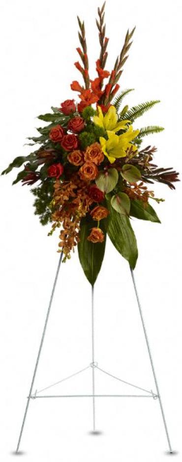 Tropical Tribute Spray -  A graceful modern funeral spray of warm colors, it includes flowers such as anthuriums, roses and tropical greenery. Presented as a standing easel display.    Item # T245-1A 