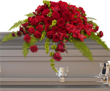 Red Rose Sanctuary Casket Spray Red Rose Sanctuary Casket Spray - Deep reds and tranquil greens both pay respect and convey heartfelt feelings at a time of loss. Traditional yet timeless, this elegant funeral arrangement is ideal for an open or closed casket. Item # T230-3A