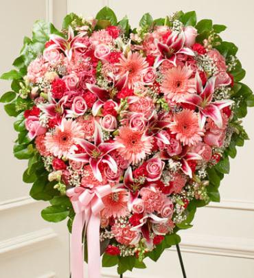 Pink Mixed Flower Heart Pink Mixed Flower Heart - This solid heart standing spray is a beautiful symbol of your sympathy and support. Item # 91276