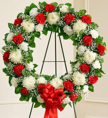 Red and White Standing Wreath Red and White Standing Wreath - This Standing Wreath is a beautiful reflection of your love and sympathy. Item # 91308