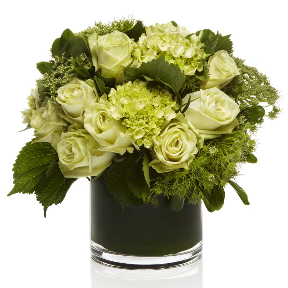 Le Grand Mojito  - • Premium green seasonal flowers with white accents • IE: Hydrangea • IE: Roses • IE: Lisianthus • IE: Orchids • IE: Ranunculus • IE: Tulip • 5'' Glass Cube or Cylinder Vase • Personalized Gift Message • The premier luxury floral gifting experience