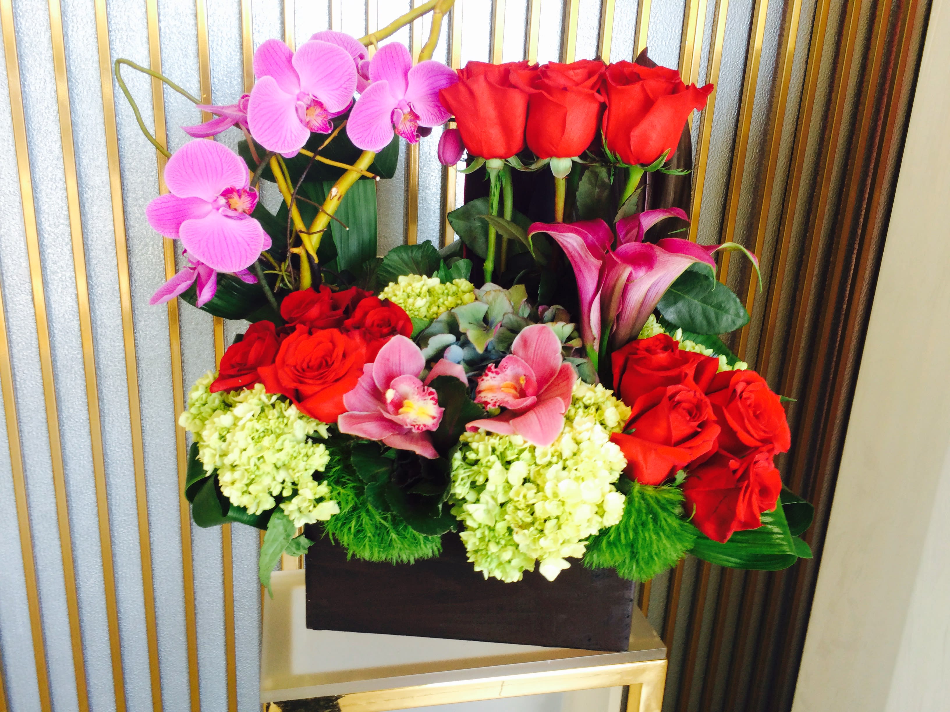 Love Frenzy Love Frenzy - Beautifully arranged selection of vandas, roses, callas and cybidiums