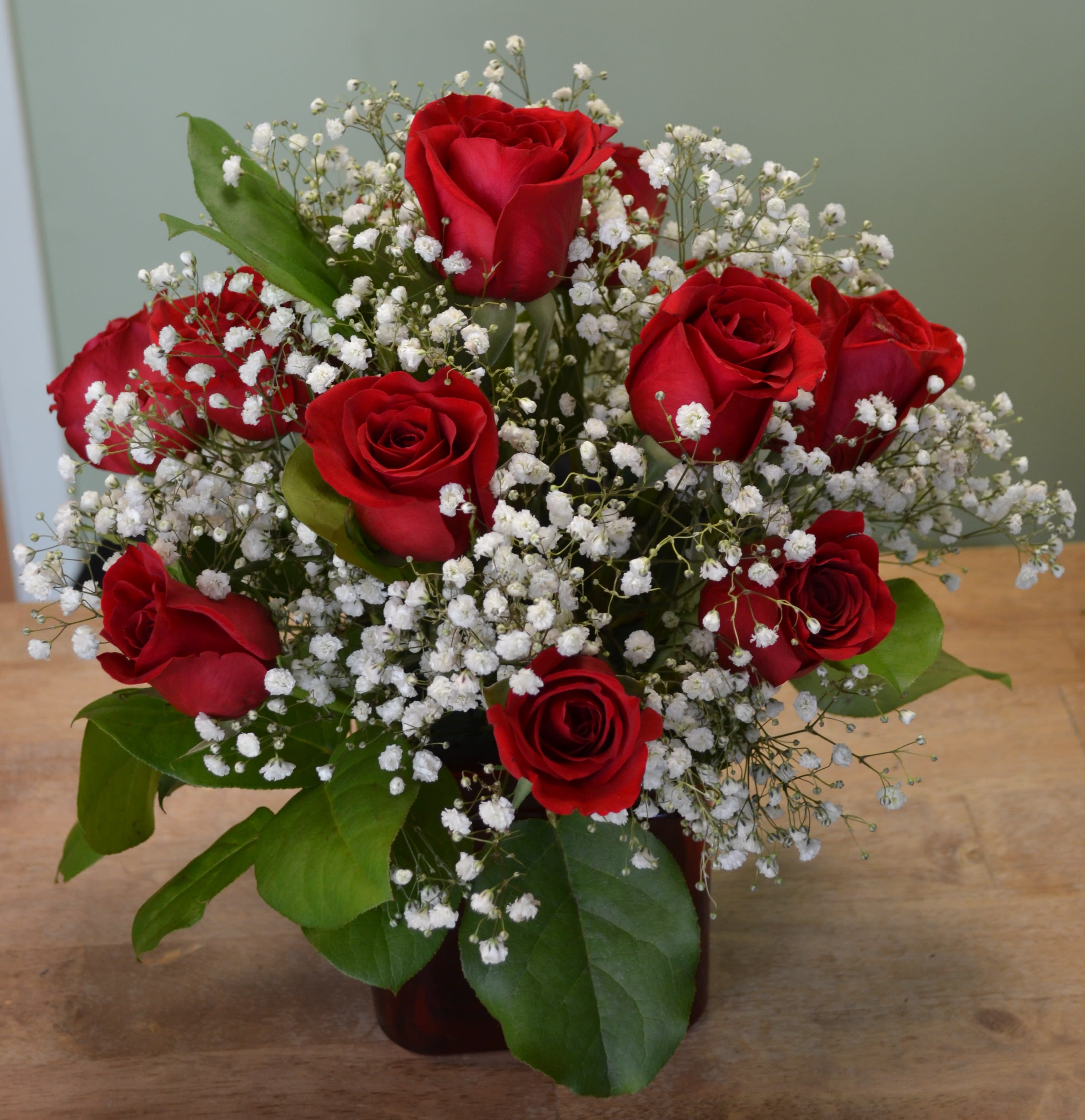 Red Roses in a Cube - A dozen red roses in a red cube.