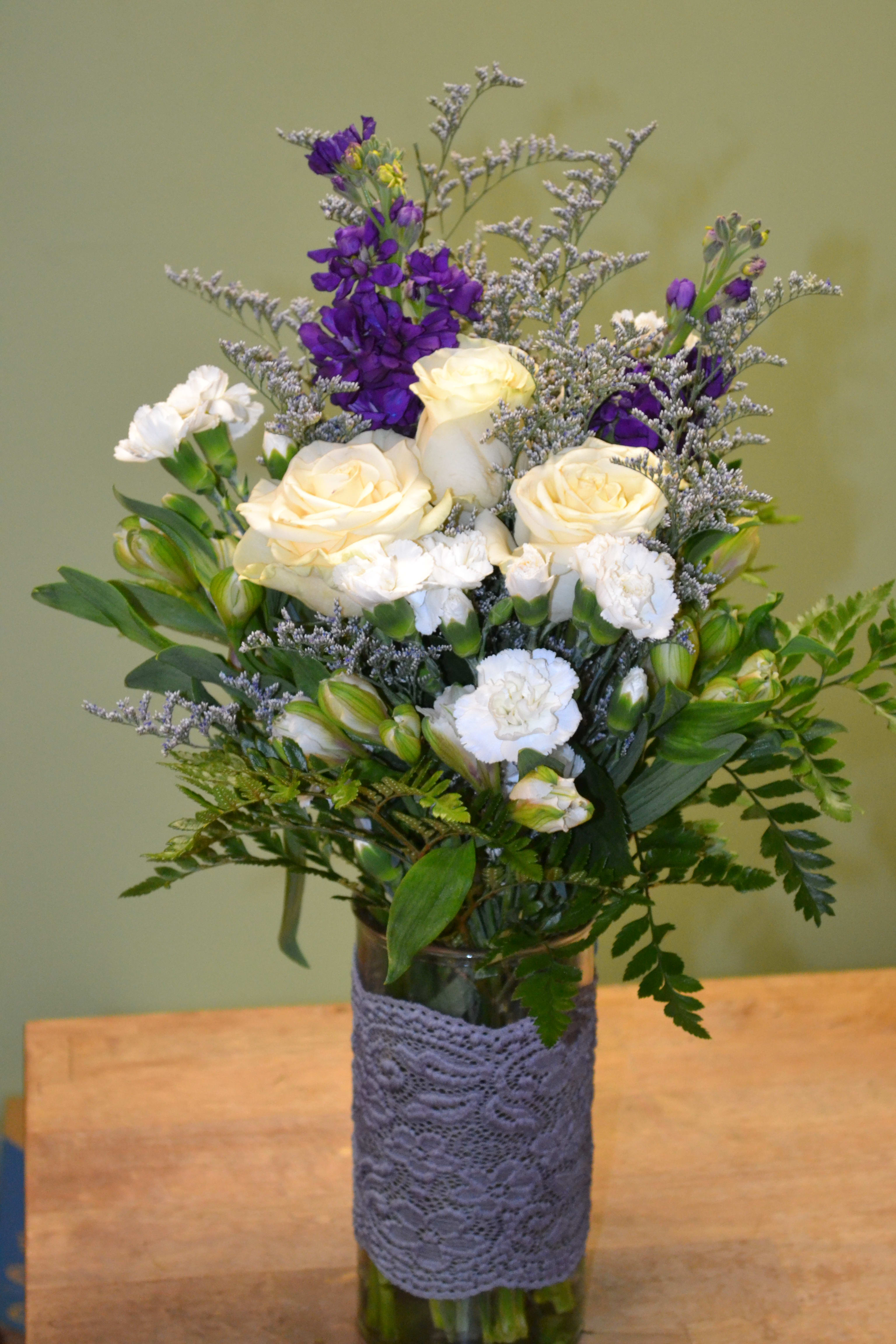 Uplifting Garden - This is a stunner. Stock, roses, mini carnations, alstro and more in a truly beautiful vase that is sure to be a winner no matter the occasion. 