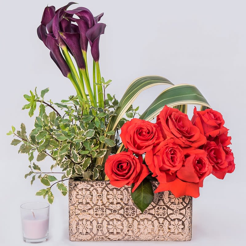 Indonesian Flare  - Cala Lilies, roses, ceramic container