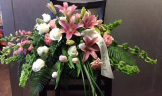 Airy Lily and Rose casket spray in Jasper, AL - The Rustic Rose Flowers and  Gifts