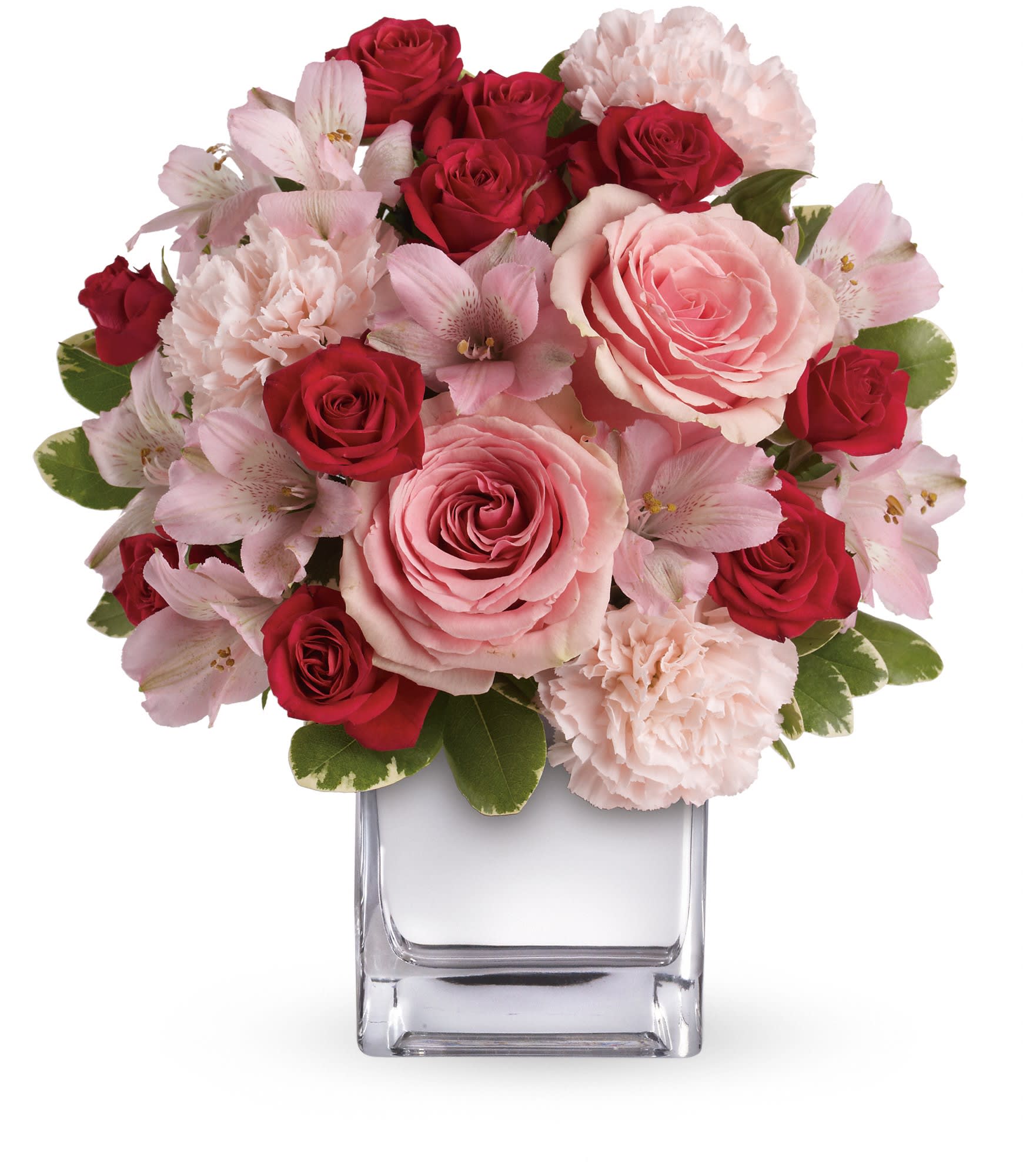 Teleflora's Love That Pink Bouquet with Roses - Passionately pretty in pink, this gorgeous array of pink and red roses and other favorites in a chic mirrored silver cube is a guaranteed heart-winner. She'll be thrilled with the gift, and knocked out by your impeccable taste. 