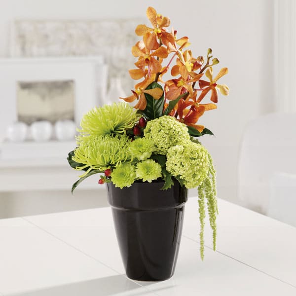 To Dad, With Love - He'll burst with pride when you remember him on his day with this striking and masterful floral vase arrangement.