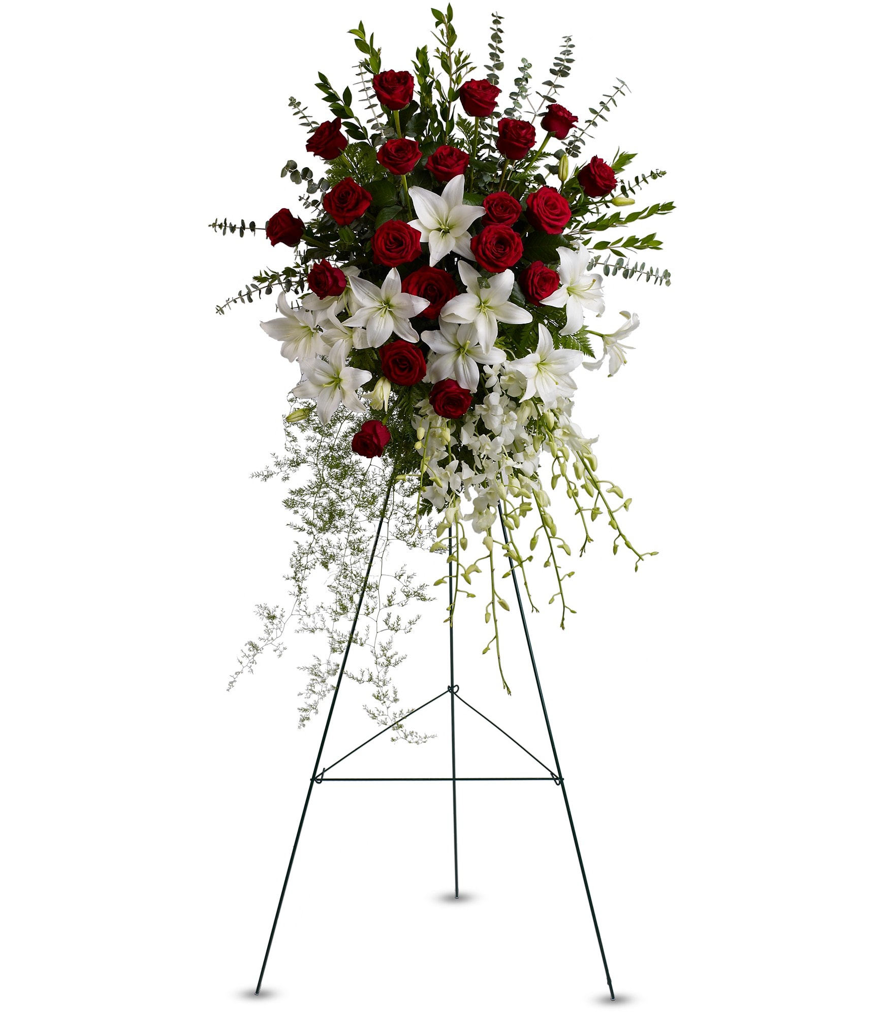 Lily and Rose Tribute Spray by Teleflora - Pure white lilies and dendrobium orchids mingle with red roses, white asiatic lilies and more in this magnificent and impressive standing spray of the finest blooms. A fitting tribute for a funeral, wake or memorial service.  