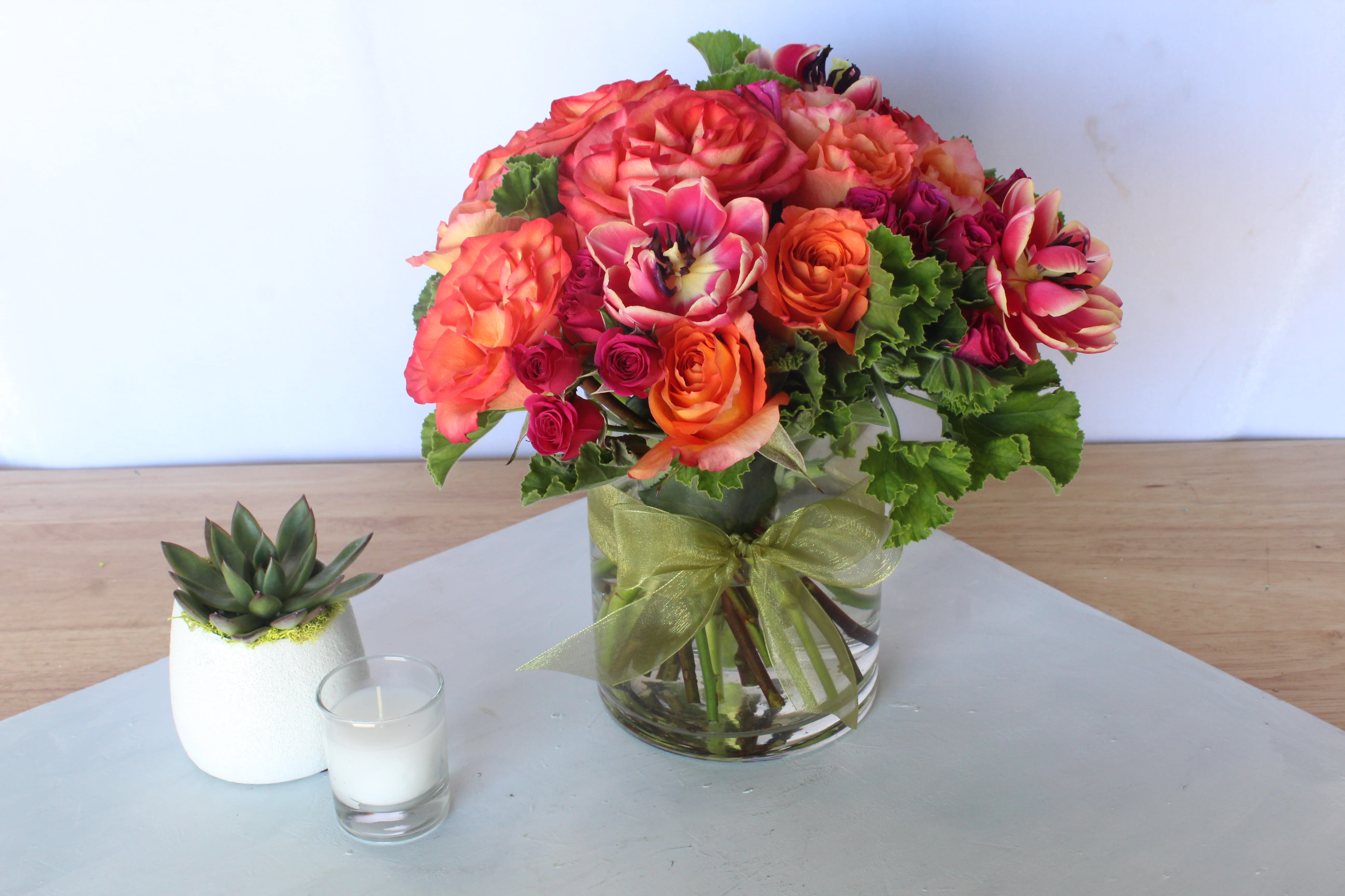 Vibrant Pink &amp; Orange Arrangement - A lush and stunning arrangement made up of premium, vibrant blooms in a tasteful vase. Florals may include: roses, ranunculus, freesia, hydrangea, and other seasonal premium blooms.  It's possible that some days we may not have the exact flowers depending on the season, or exact container specified on the arrangement's description. When this is the case, our bouquets are made with flower substitutions or delivered in a different vase than expected by using substitutions of an equal or higher value. If you'd prefer no substitutions, please send an email or call us after placing your order. Please give us at least three days notice if you're looking for an arrangement with no substitutions.