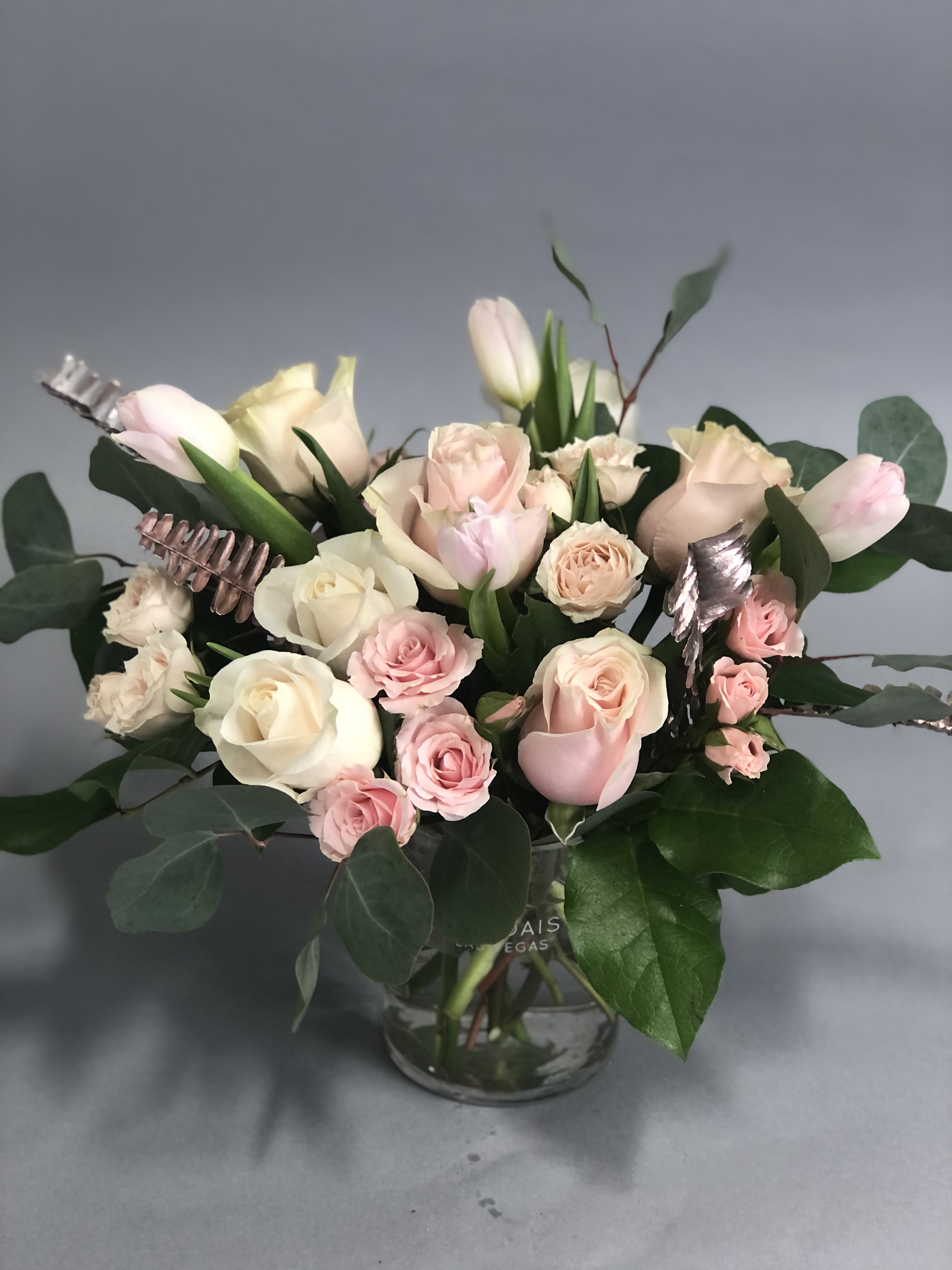 Pink Lady  - This soft and sweet arrangement of pinks and blushes is sure to make anyone in your life blush like the sweetheart they are! 