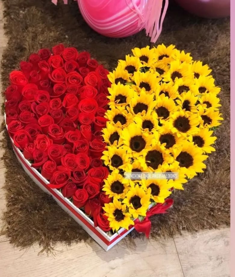 Happiness Heart Shape Happiness Heart Shape - Woow this heart shape composed of approximately 70 red rosed and 45 sunflowers is a perfect way to make her/him feel so special and loved
