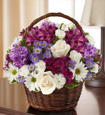 Peace, Prayers, &amp; Blessings- Lavender and White - Product ID: 95425   Express your heartfelt sympathy with a graceful arrangement of peaceful lavender and white blooms such as roses, stock, alstroemeria and more. Designed by hand in a lovely basket, it's a beautiful tribute to a life well lived. Graceful lavender and white arrangement of roses, stock, alstroemeria, daisy poms, mini carnations and monte casino, accented with variegated pittosporum and myrtle Hand-arranged in a willow handled basket; measures 8&quot;H Appropriate to send to the home of friends and family members or to the memorial service Large arrangement measures approximately 12&quot;H x 12&quot;L Medium arrangement measures approximately 11&quot;H x 11&quot;L Small arrangement measures approximately 10&quot;H X 10&quot;L Our florists hand-design each arrangement, so colors, varieties, and basket may vary due to local availability days