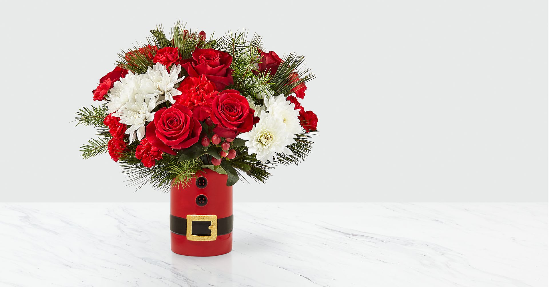 lets be jolly bokay - Vibrant red roses, white cushion pom poms designed in a santa vase with raised black buttons.
