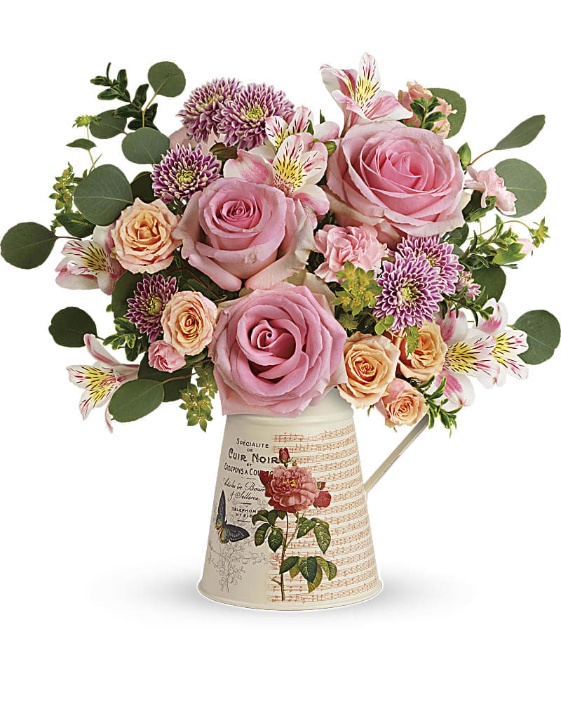 Teleflora's Vintage Chic Bouquet Teleflora's Vintage Chic Bouquet - Tres chic! With its charming vintage vibe and delicate bouquet of pink and peach roses, this hand-glazed metal water pitcher is the perfect Mother's Day treat! This chic bouquet includes pink roses, peach spray roses, white alstroemeria, pink miniature carnations, lavender cushion spray chrysanthemums, bupleurum, oregonia, and silver dollar eucalyptus. Delivered in a Mod Mademoiselle pitcher.