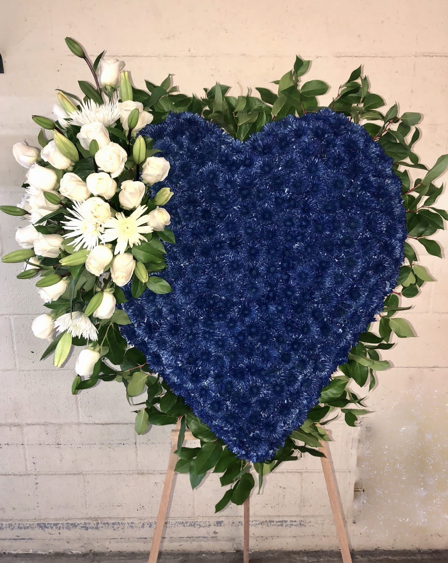Blue Heart Blue Heart - Large blue heart with pom pom, lemon leafs and white roses. The heart could also be made in other colors if requested.