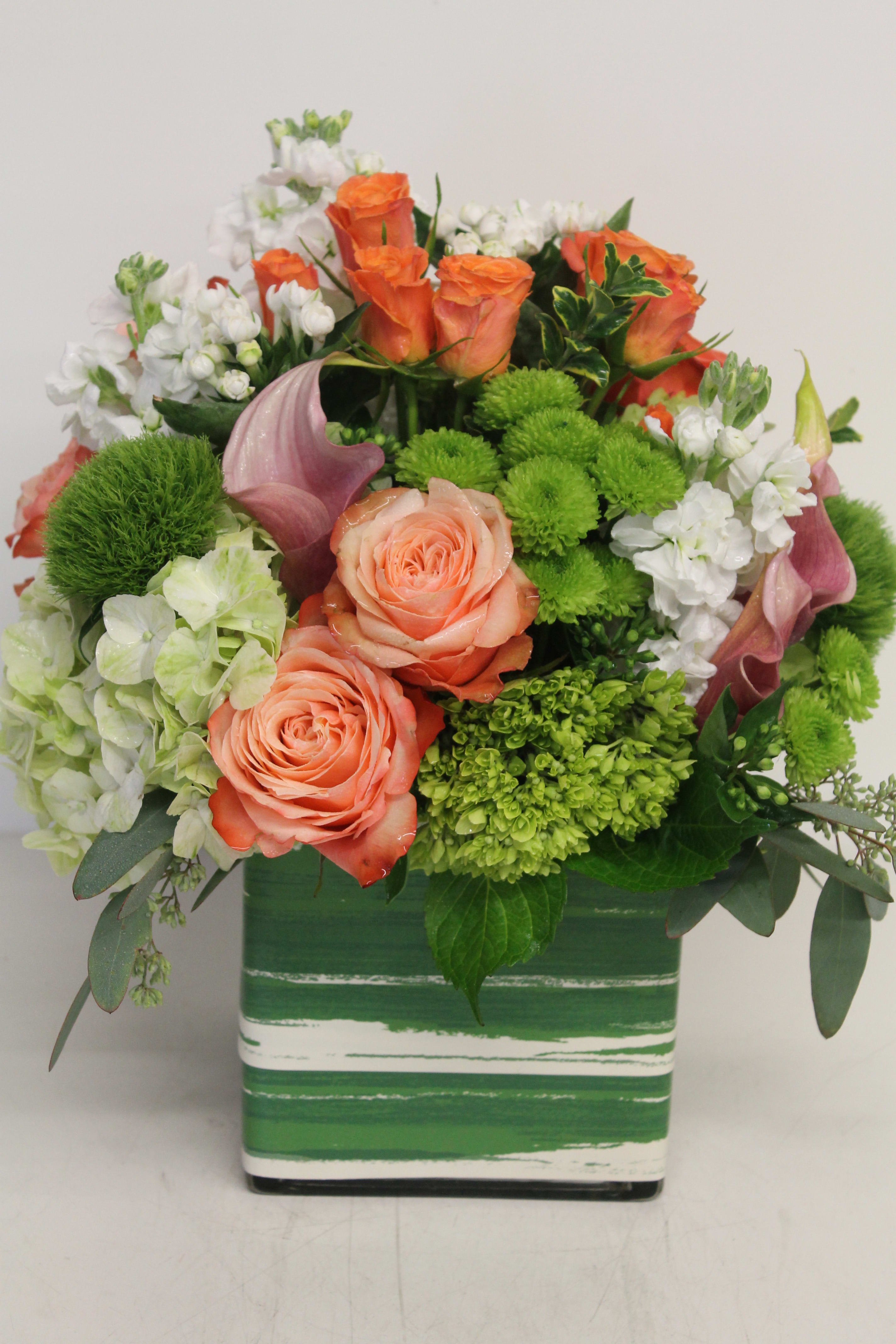 Fun Bouquet - In this arrangement Roses and spray roses in different shades have been used to creat a good feeling.