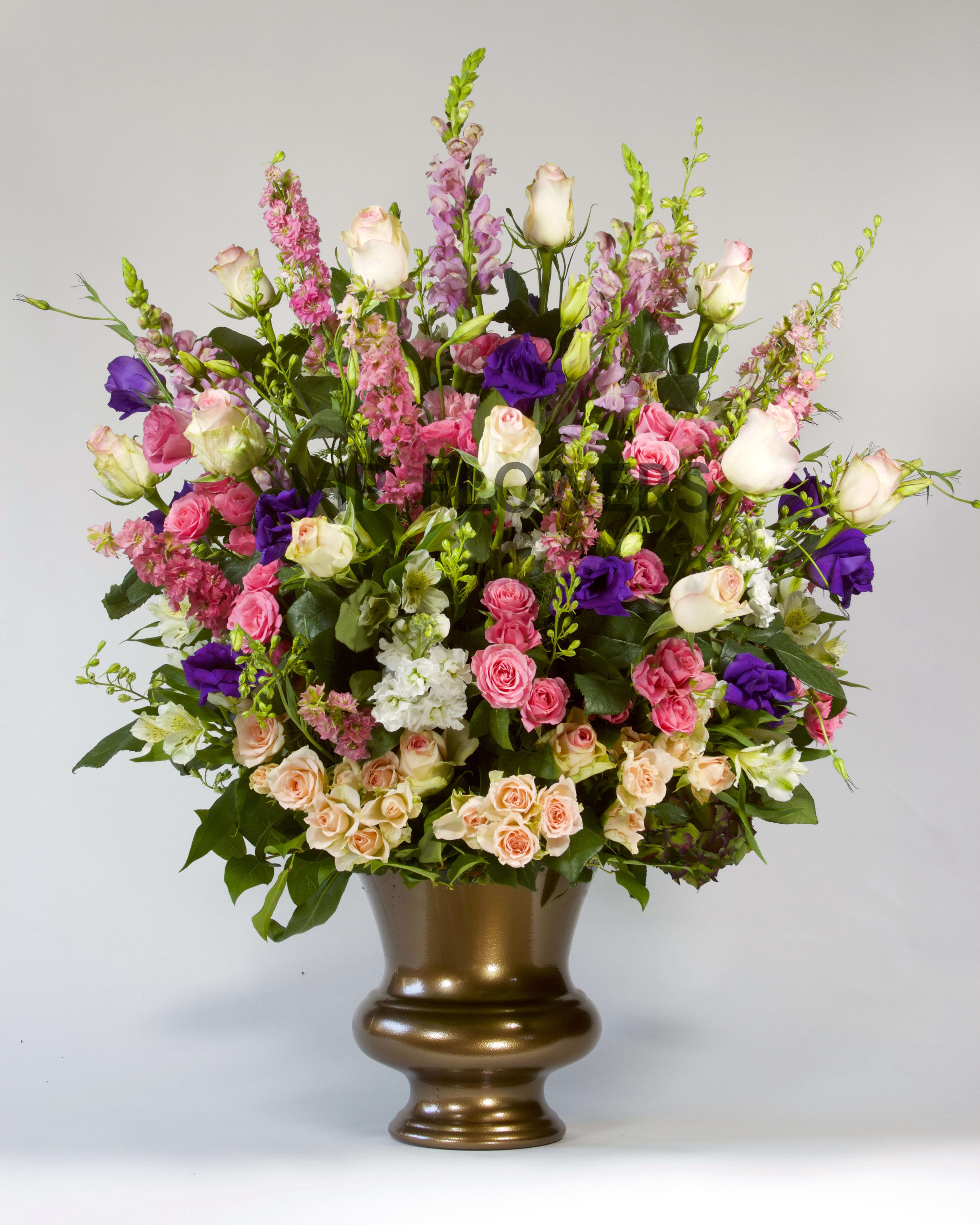 Elegance &amp; Finesse - Look at how beautiful this mixture of flowers is! The colors blend in so peacefully and elegantly! The different shades of roses and the way the snapdragons increase the arrangements size is remarkable!      Substitutions may be necessary to ensure your arrangement or specialty gift is delivered in a timely manner. The utmost care and attention is given to your order to ensure that it is as similar as possible to the requested item (Please note that some flowers and colors may vary due to seasonality.)