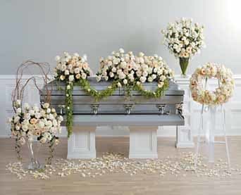 Monochromatic Casket Spray, Easel Wreath, Dual Vase Arrangements - As Shown : 2 large vases, 1 18inch wreath, and 2 casket sprays with draping greenery of elusion  of being attached  Using the most softest elegant colors. 