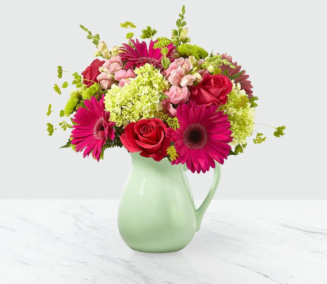 Sweet as Watermelon™ Bouquet - Inspired by our favorite summer essential, our Sweet as Watermelon™ Bouquet is the perfect pick every time. It's handcrafted by a local florist with a refreshing mix of roses, hydrangeas and gerbera daisies in a mint reusable pitcher that comes right to their door. 