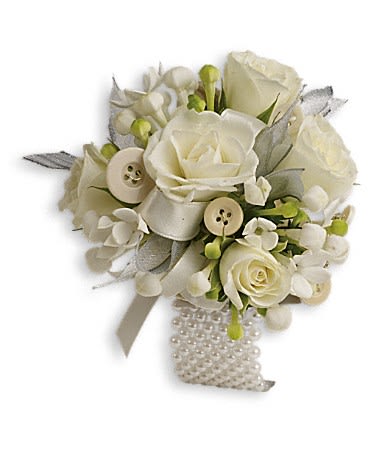 All Buttoned Up Corsage - Delight them all with this romantic arrangement of white blooms and whimsical buttons. White bouvardia and white spray roses with button accents.