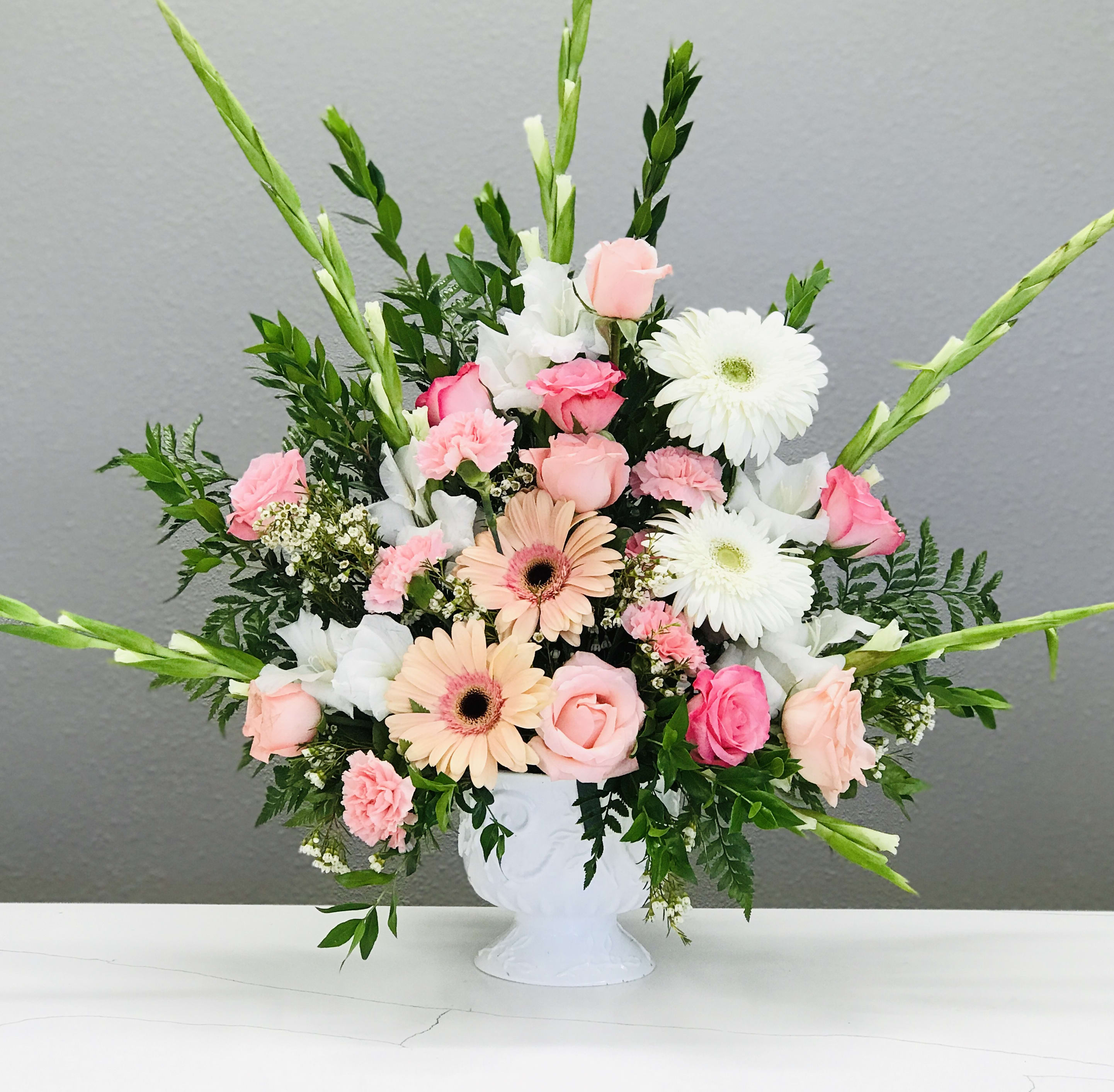 Morning blush Morning blush - Playful pink and white blooms celebrating life and your loved one.