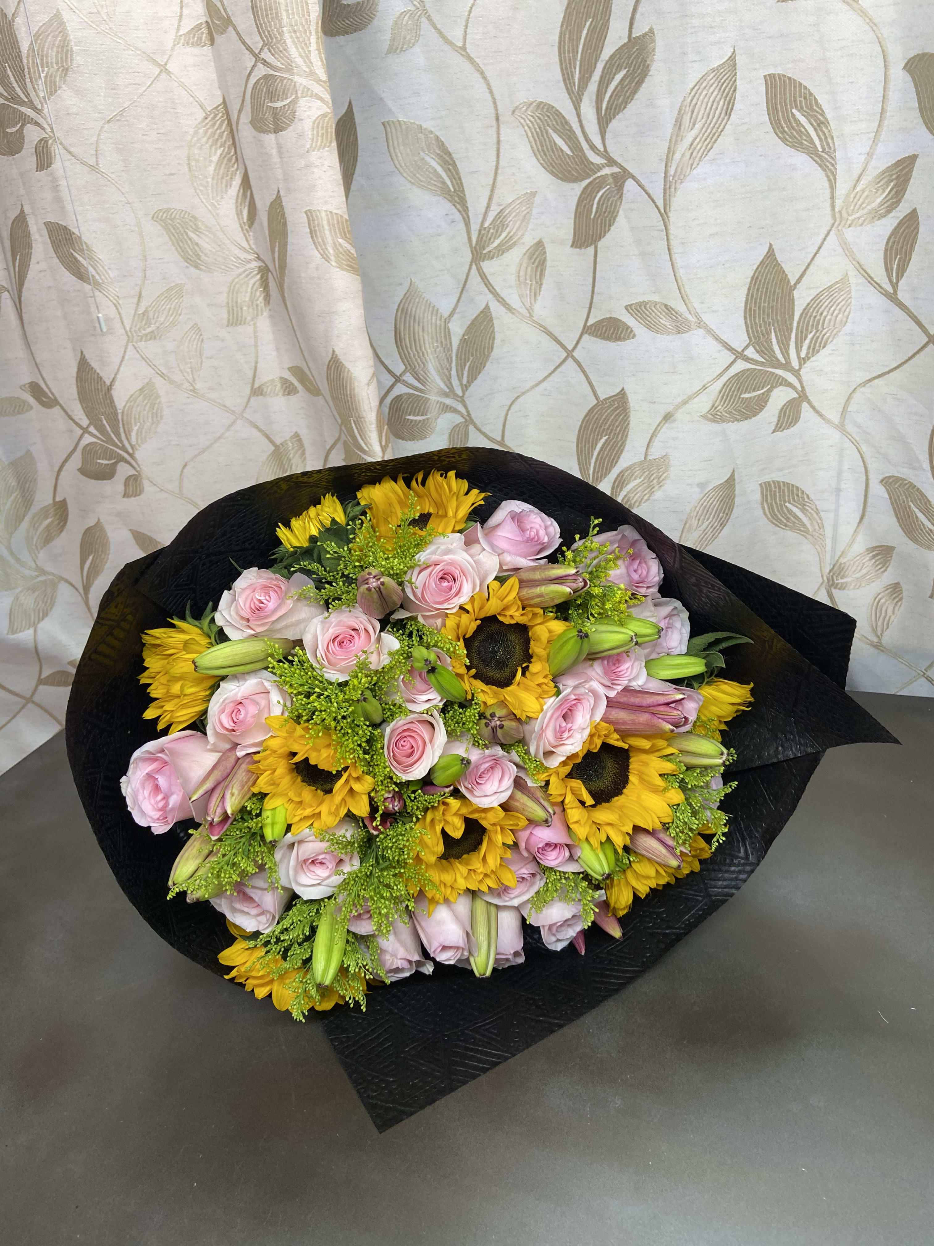Melody Bouquet - Beautifull Big Bouquet with 24 Pink Roses, 10 Sunflower, 5 Asiatic Lilies, and Solidaste, wrap with Black Paper, and Pink Ribbon