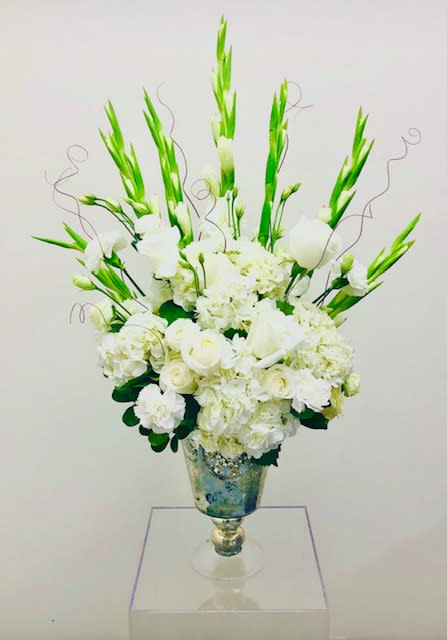Divine Serenity - Beautiful display of white flowers-roses, hydrangea, lisianthus, carnations, gladiolus gracefully arranged in a neutral vase.  *Please view policy section regarding substitutions.