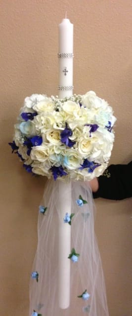 Candle Boy 2 Candle Boy 2 - Fresh White hyndrangea, white roses and blue delphinium belladonna are used on white candle 30"H, with tulle is about 34"H. Tulle white: 1 layer ( transparent material )