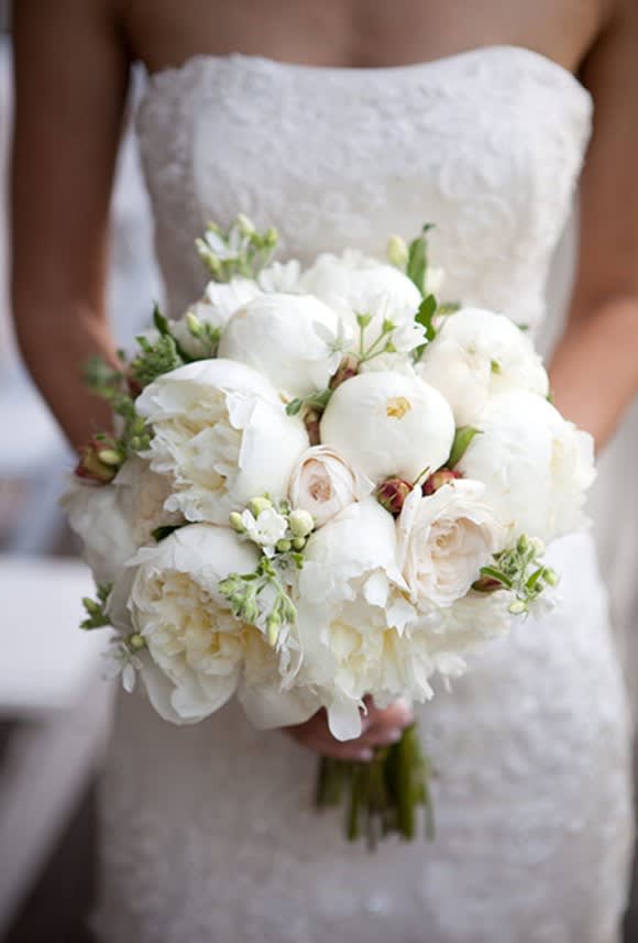 Peonies Bridal Bouquet - Classic brides will love an all-white bouquet, like this one filled with lush peonies and garden roses. Available in pink color as well.