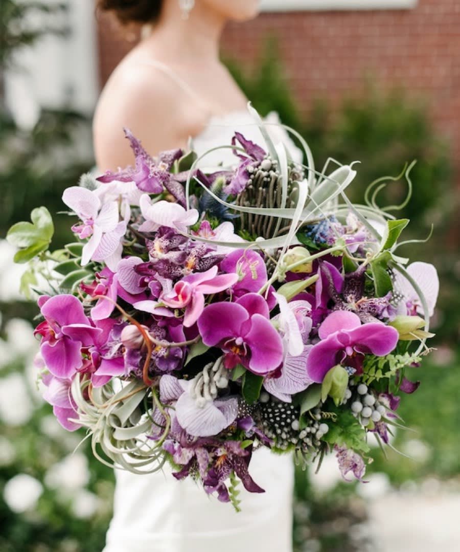 WB-2199 WB-2199 - Take a deep breath! This stunning bridal bouquet has it all! Phalaenopsis orchids, dendrobium orchids, silver brunia, succulents, eryngium, curly willow and more.