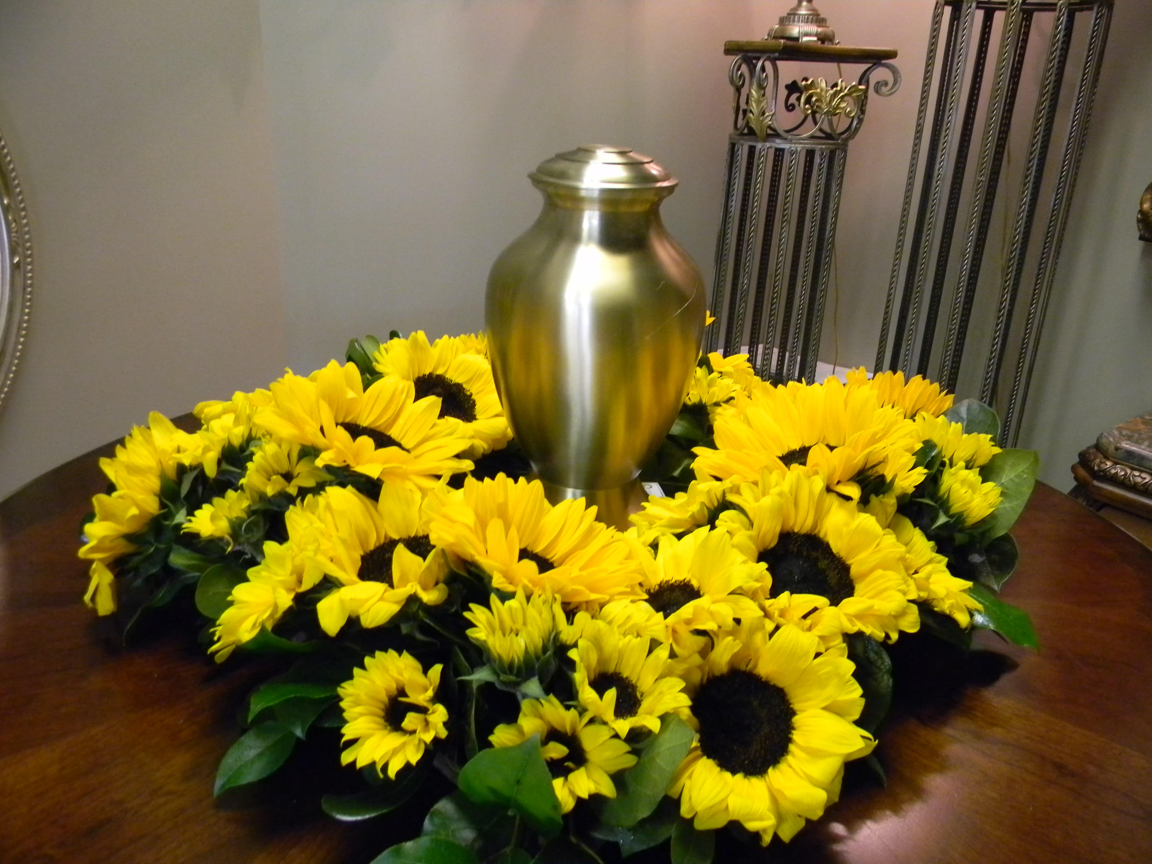 sunflower fields sunflower fields - a square urn wreath designed as if a field of flowers surround your loved one touches of foliage accent the beauty of the sunflowers