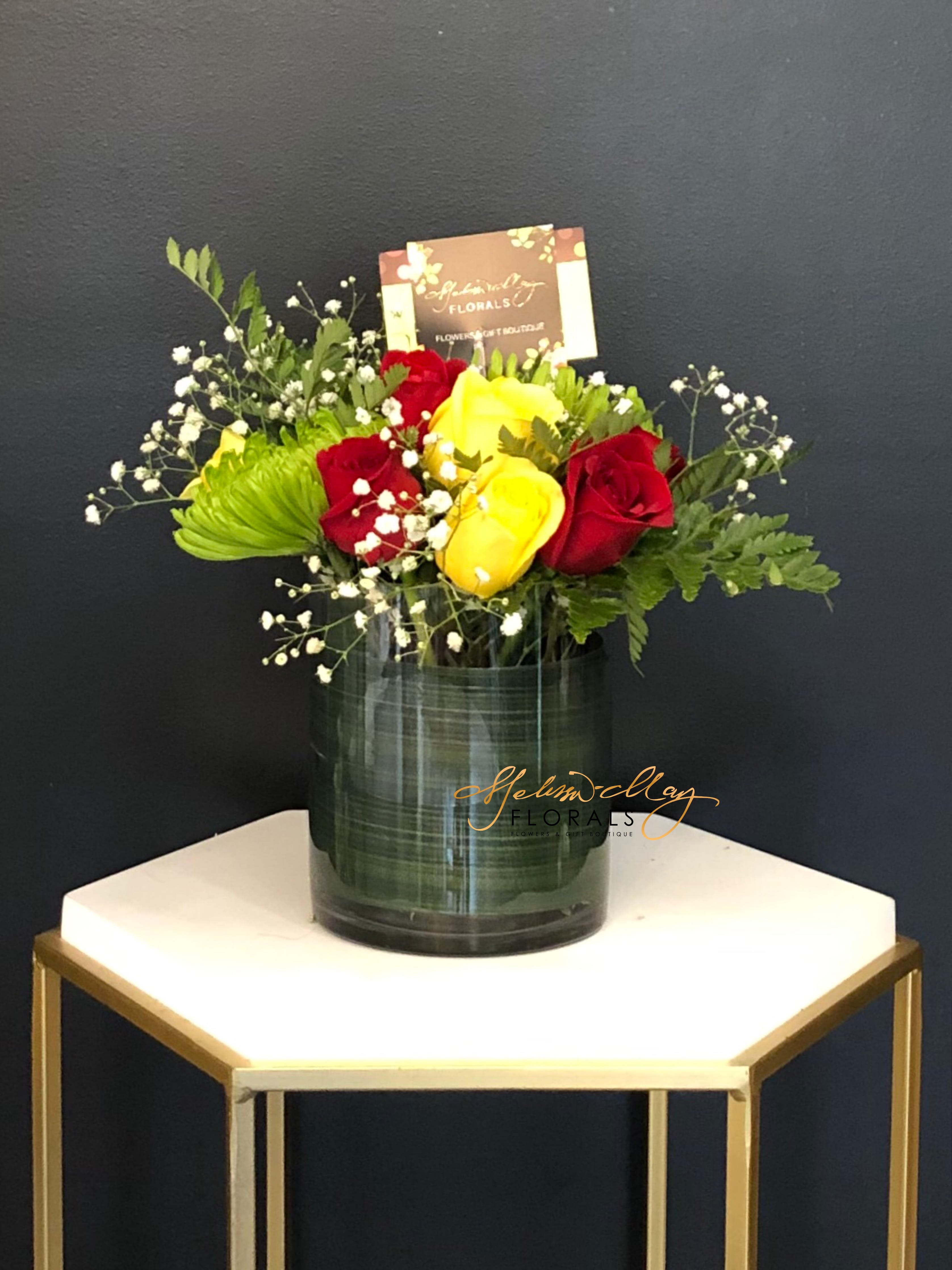 Joyful Praise - When you wake up in the morning you always want to be the joyfullest person there is. Always remember never to miss that happy beat. Come touchdown with our football mums and score some beautiful red and yellow roses.