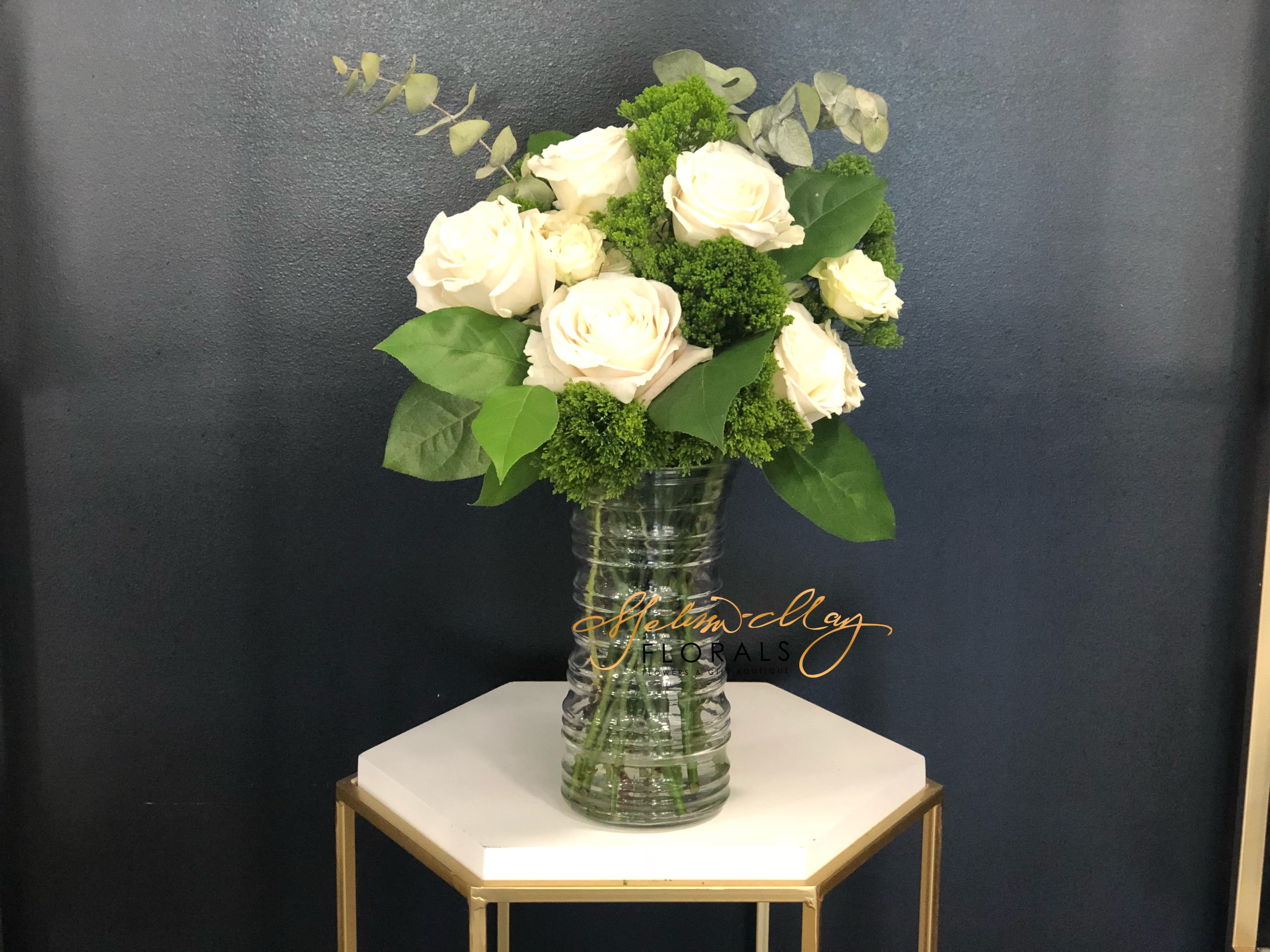 Everlasting Innocence  - Picking up an arrangement of all white roses is always the best option. They add a touch of purity and everlasting love to each occasion.  A perfect touch for weddings and bridal showers or even funerals. 