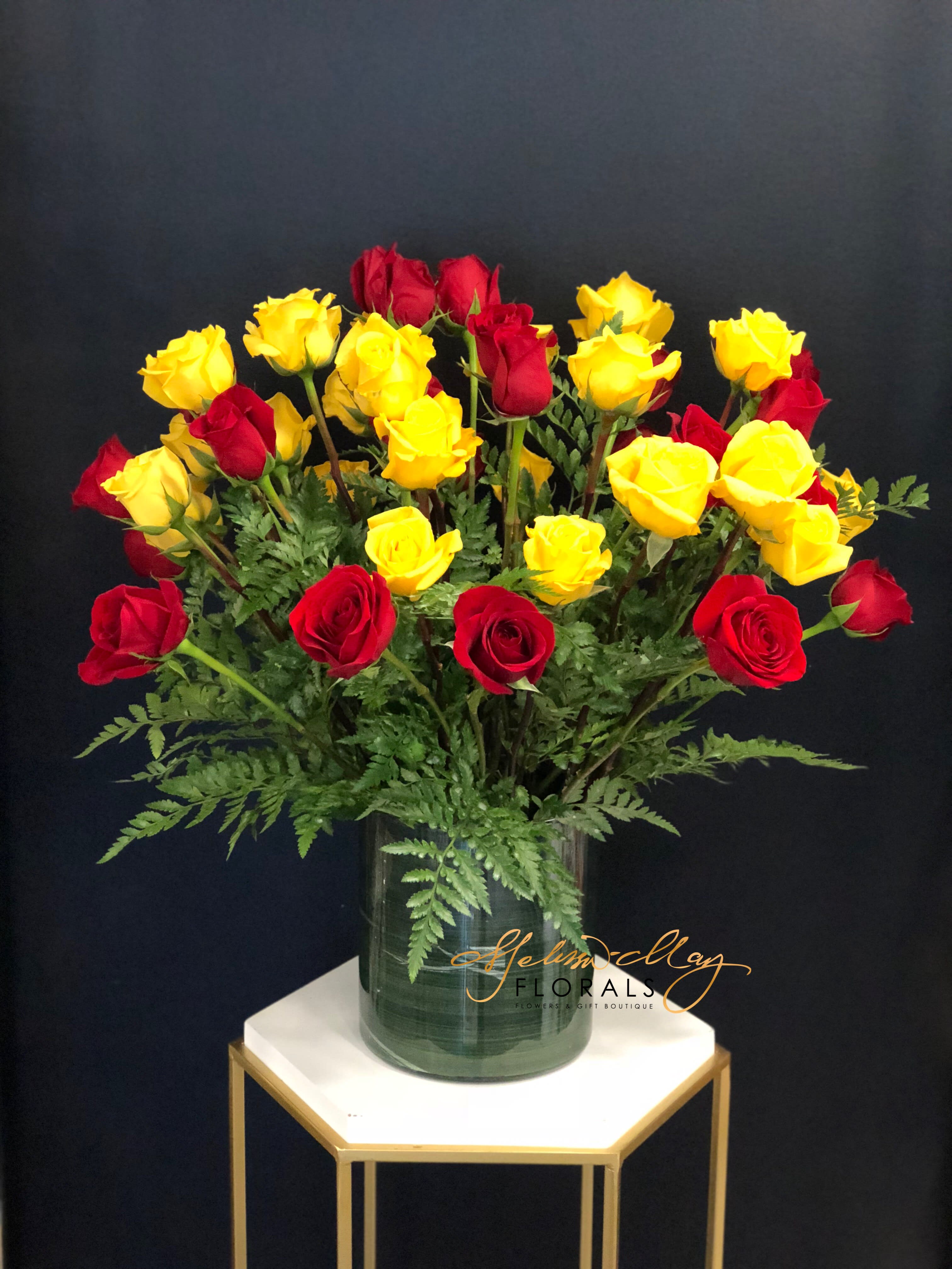 Lover and Friends - Surprise your lover with an arrangement that not only tells them you value their friendship but their love as well with 3 dozen roses red and yellow roses. With this beauty of the perfect blend of red and yellow roses no one can resist this piece. 