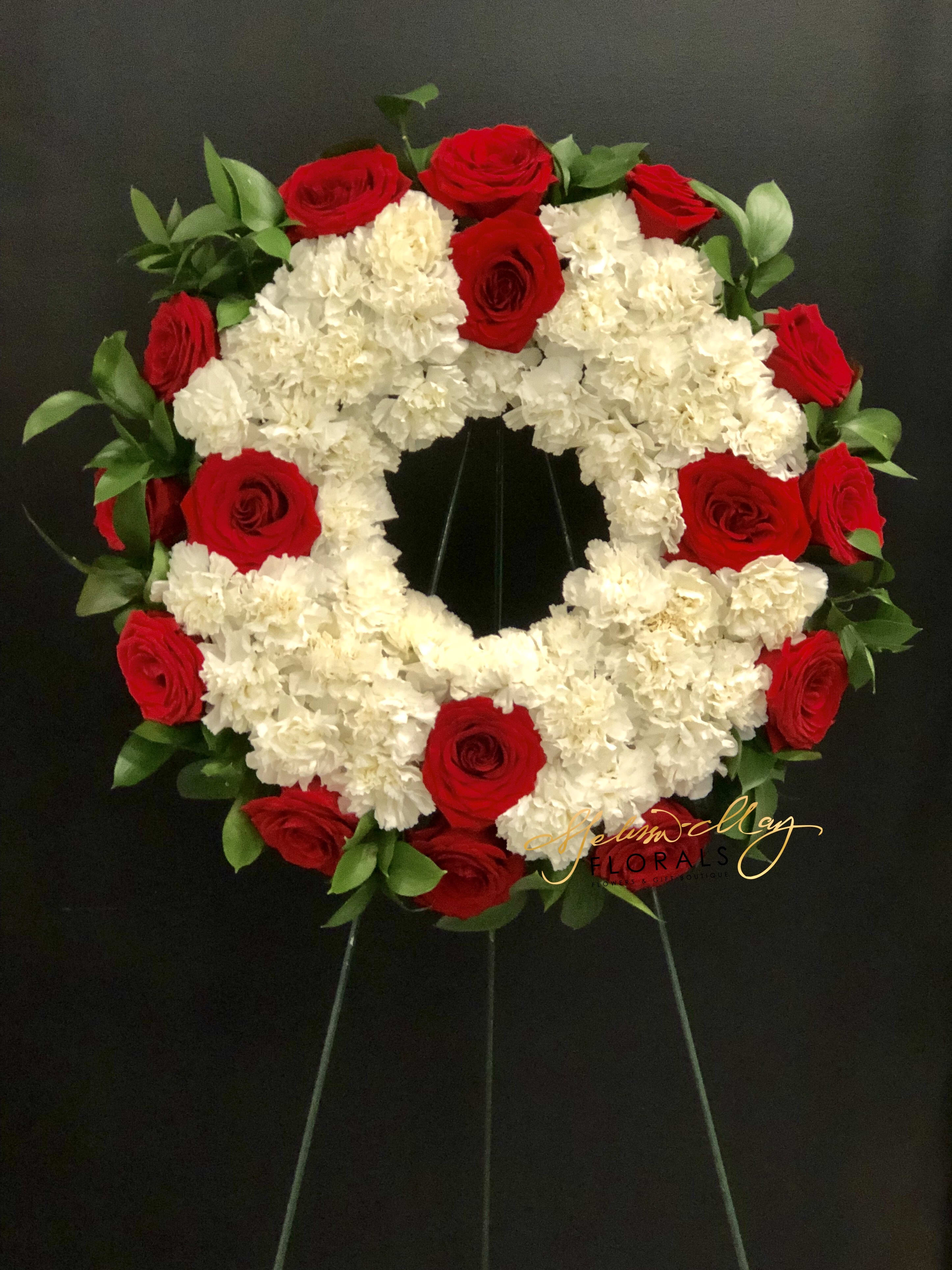 Your Forever Love - At the saddest moment in your life it may feel like the world is falling apart. When you are front of this funeral spray you will have the beautiful memories come back to life. Its filled with red roses and white carnations. 