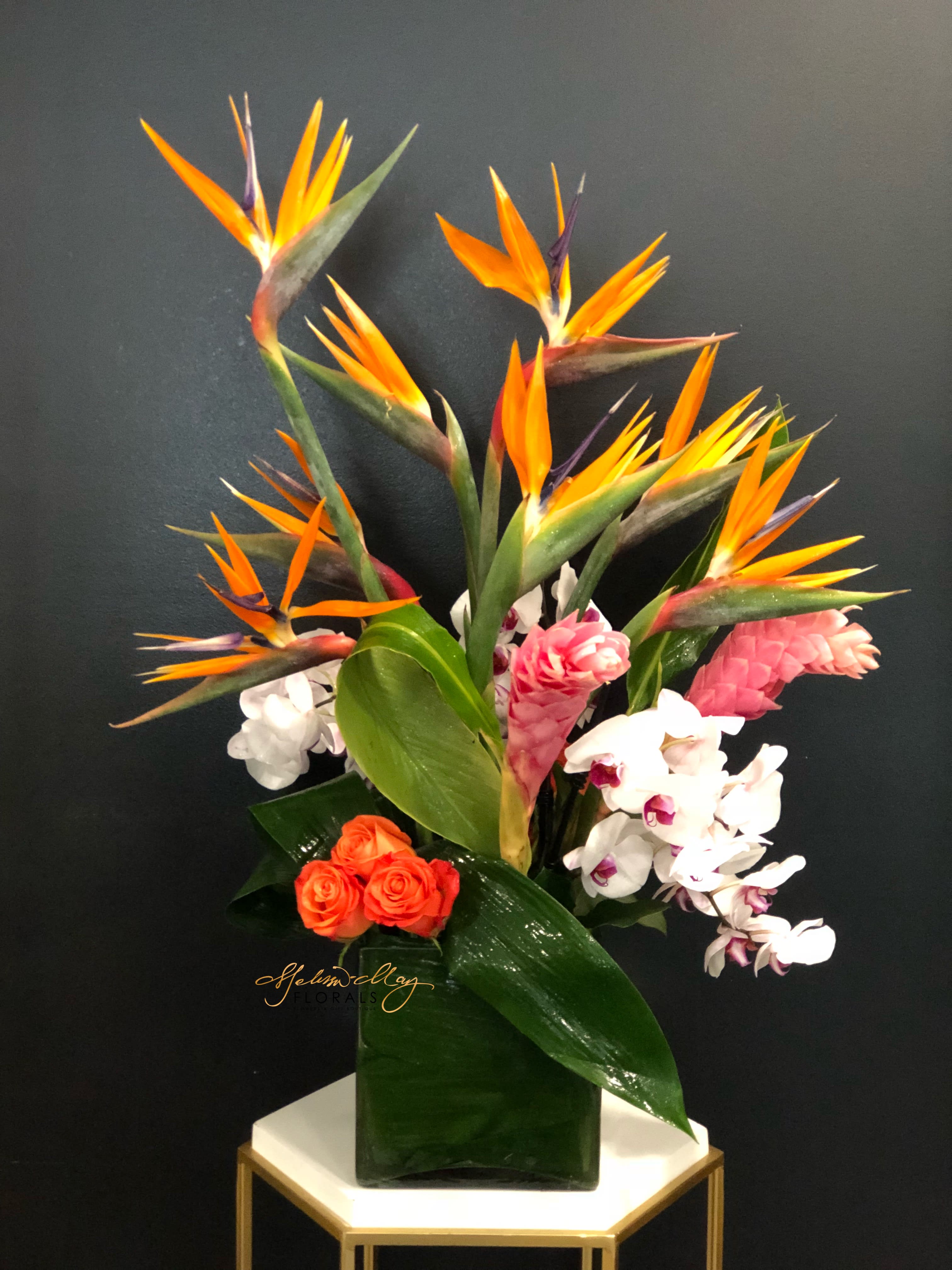 Island Remembrance - The island  of all beautiful memories that you will never especially of you on a island. With birds of paradise and many other flowers.  Please be advised this order must be placed at least two days in advance for delivery.