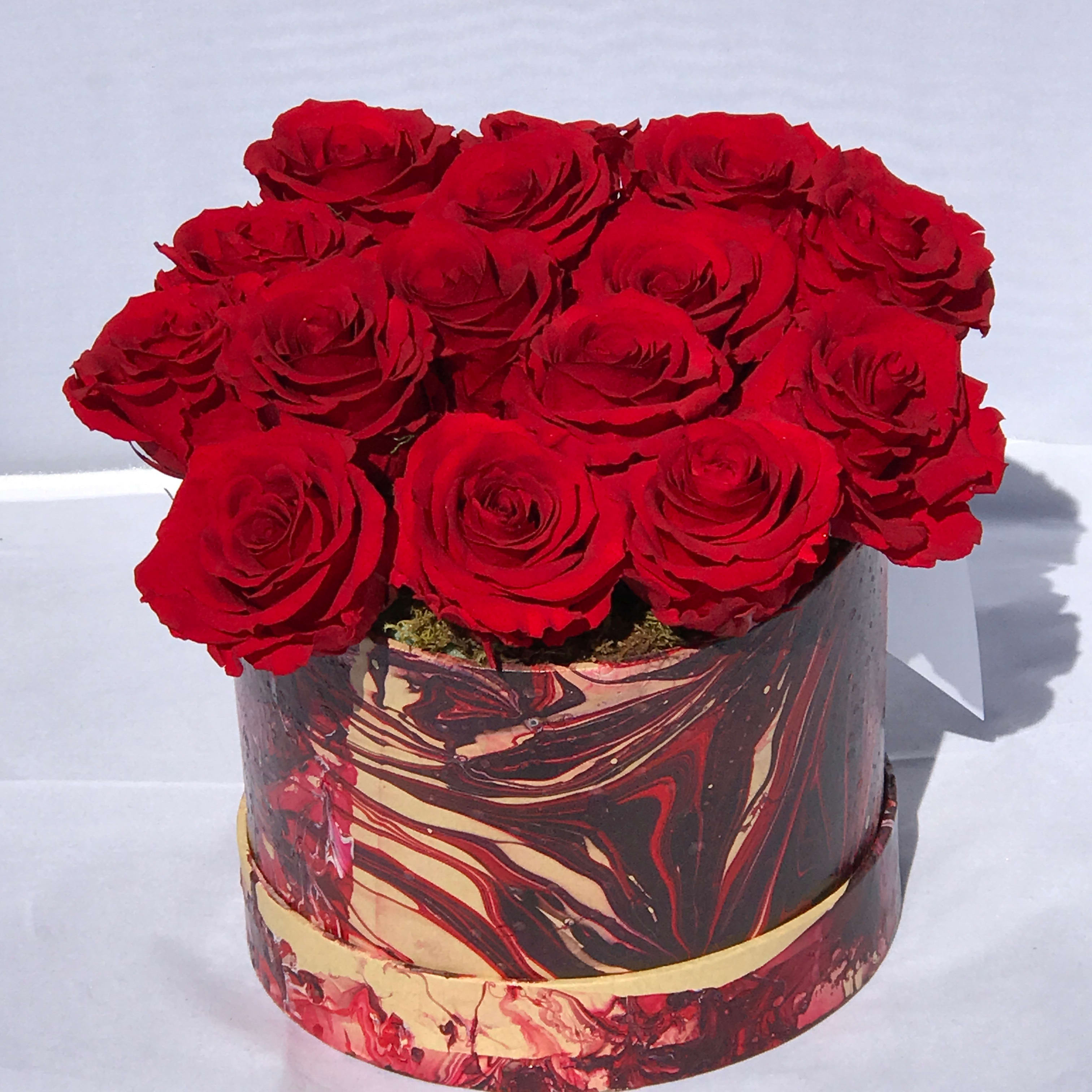 By Art  - Forever Rose collection  offers many preserved rose options.   Imagine the beauty and aroma of a fresh rose that is perfectly preserved. It requires no water. No sunlight. It simply rests in its beautiful crafted container to be admired for over 365 days. An immaculate gift that represents a pure, enduring and effortless love. Shop The Forever Roses collection. only at Helms Flowers Inc 