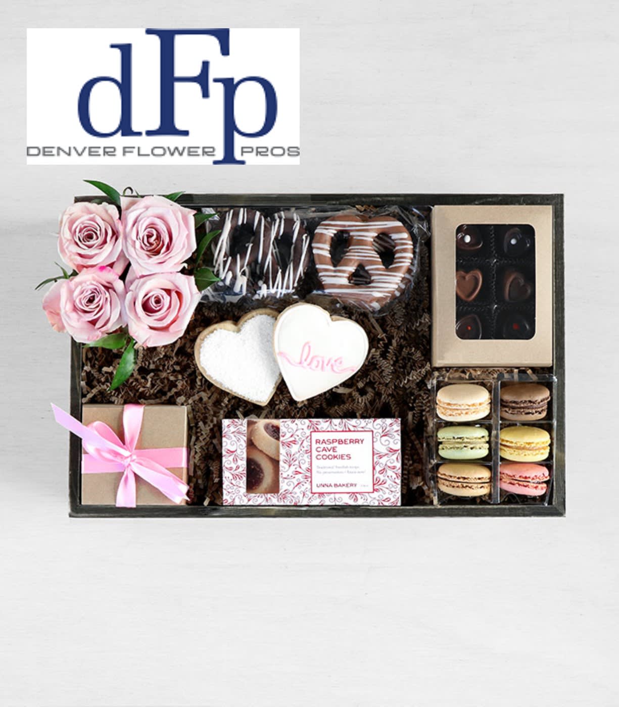Roses and local sweets Gift box Roses and local sweets Gift box - Locally made sweets , Chocolate covered pretzels, Macarons , local chocolate, and cookies and a perfect rose budvase
