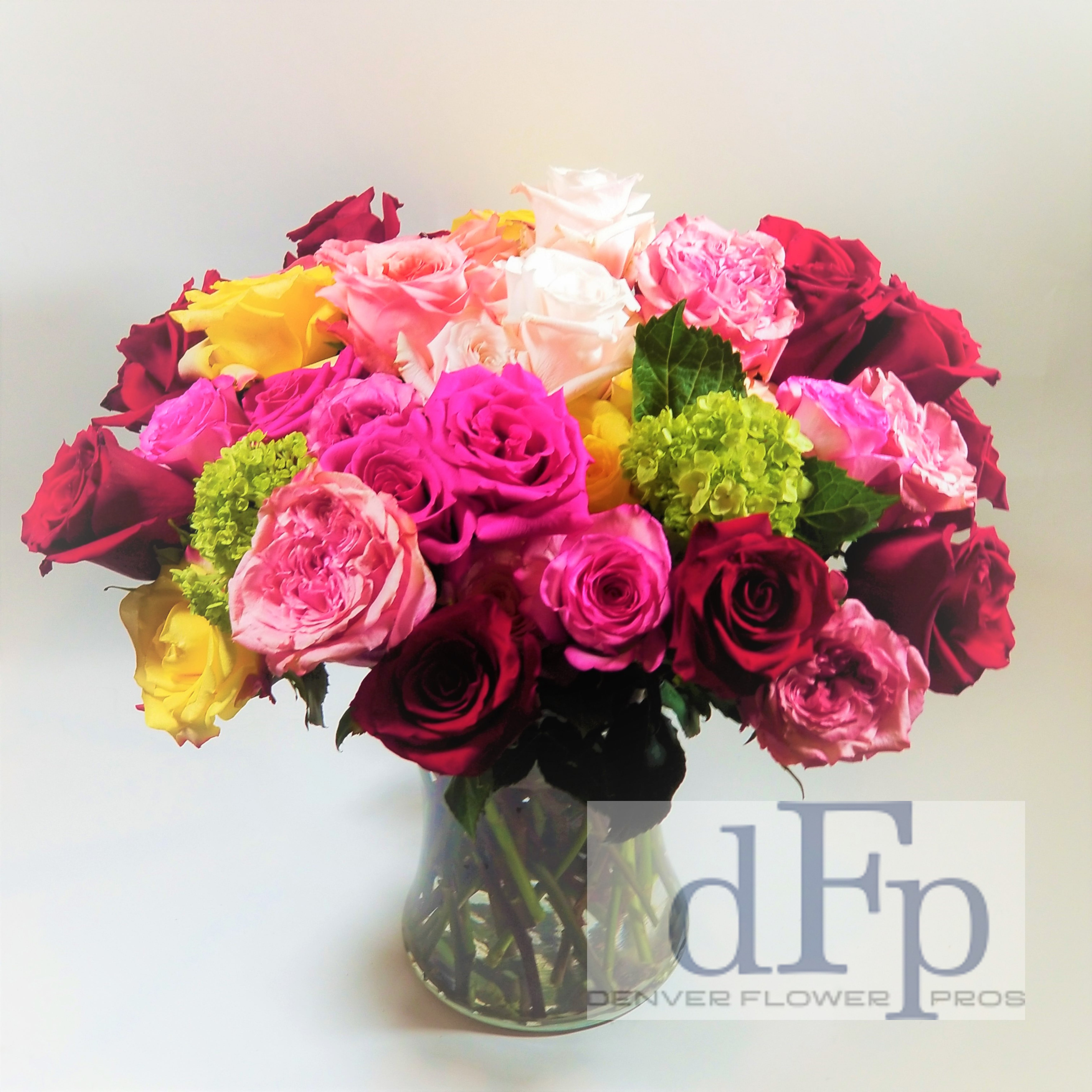 4 dozen Premium Rose Arrangement 4 dozen Premium Rose Arrangement - 4 dozen of the nicest roses you have ever seen . All our roses are sustainable grown and under rules set in the Fair Trade movement. Bright colors , large head size and a perfect mix of roses and Garden Roses.