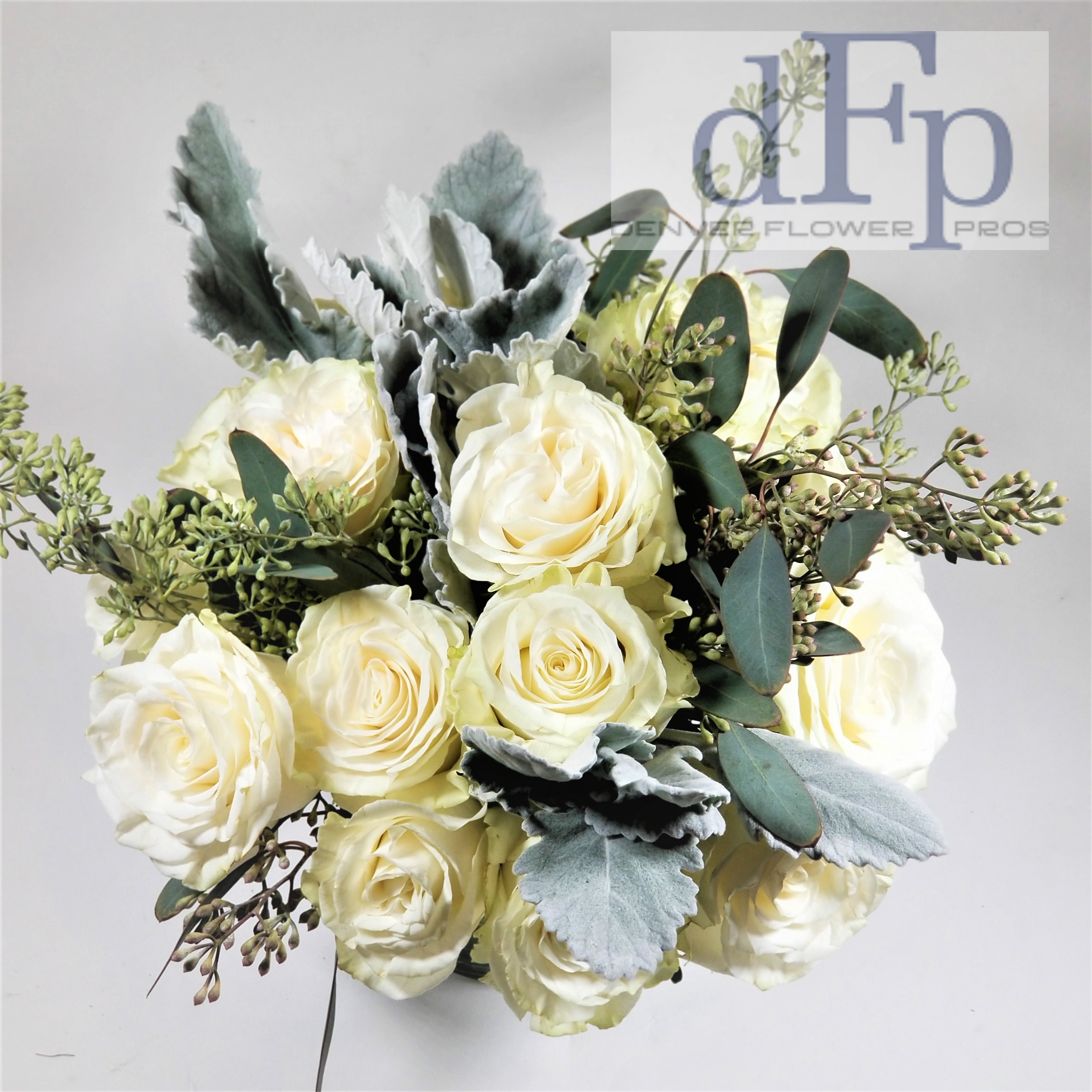 White Rose Bowl White Rose Bowl - A white rose bowl , starting with one dozen slightly fragrant roses in a glass bowl . We use seasonal greenery and the image might differ slightly