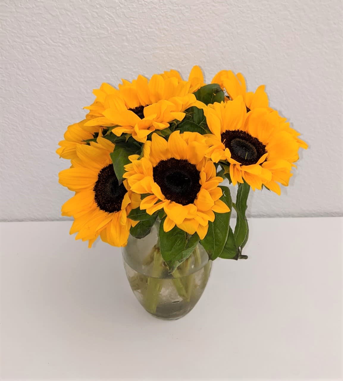 Sunflower Delight by Flower Infinity  - A delightful bunch of fresh sunflowers to brighten up your day! Perfect for your work at home office space or living room table. 