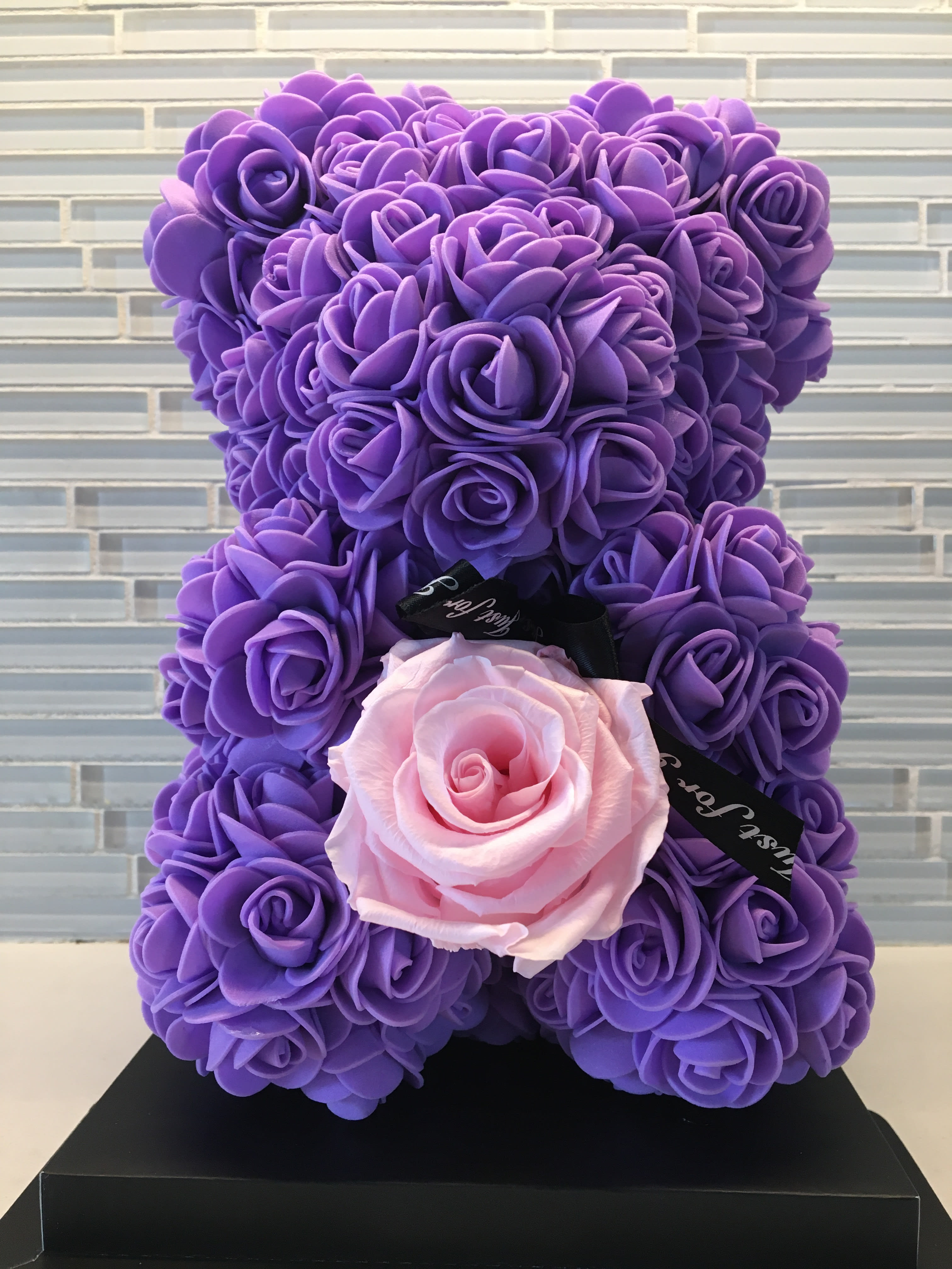 Purple Teddy Bear in Box with Pink Preserved Rose in Doral, FL | Leon Flowers inc.