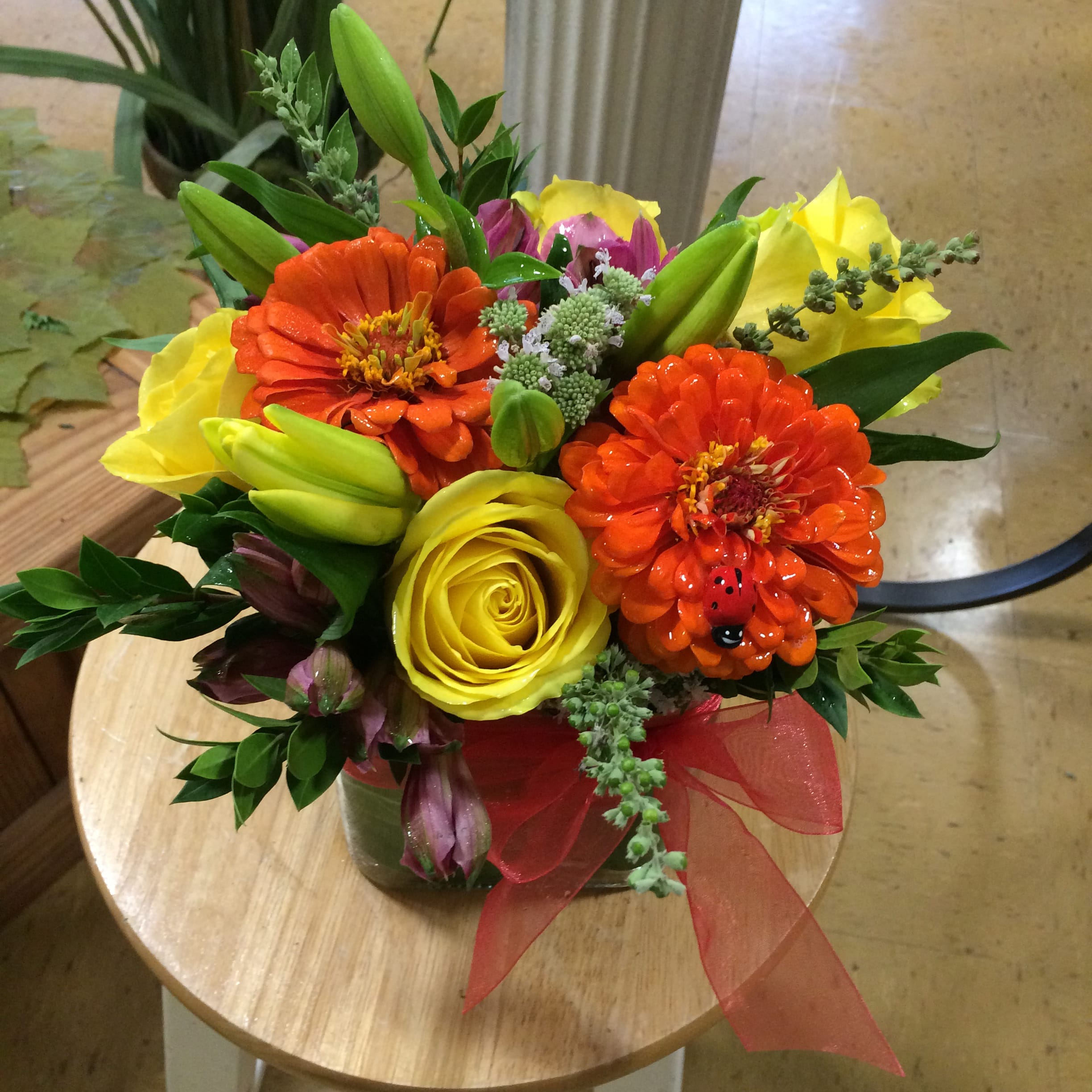 Color Palette - A colorful arrangement with bright orange, yellow and purple. Perfect for any occasion,birthday, get well or congratulations.