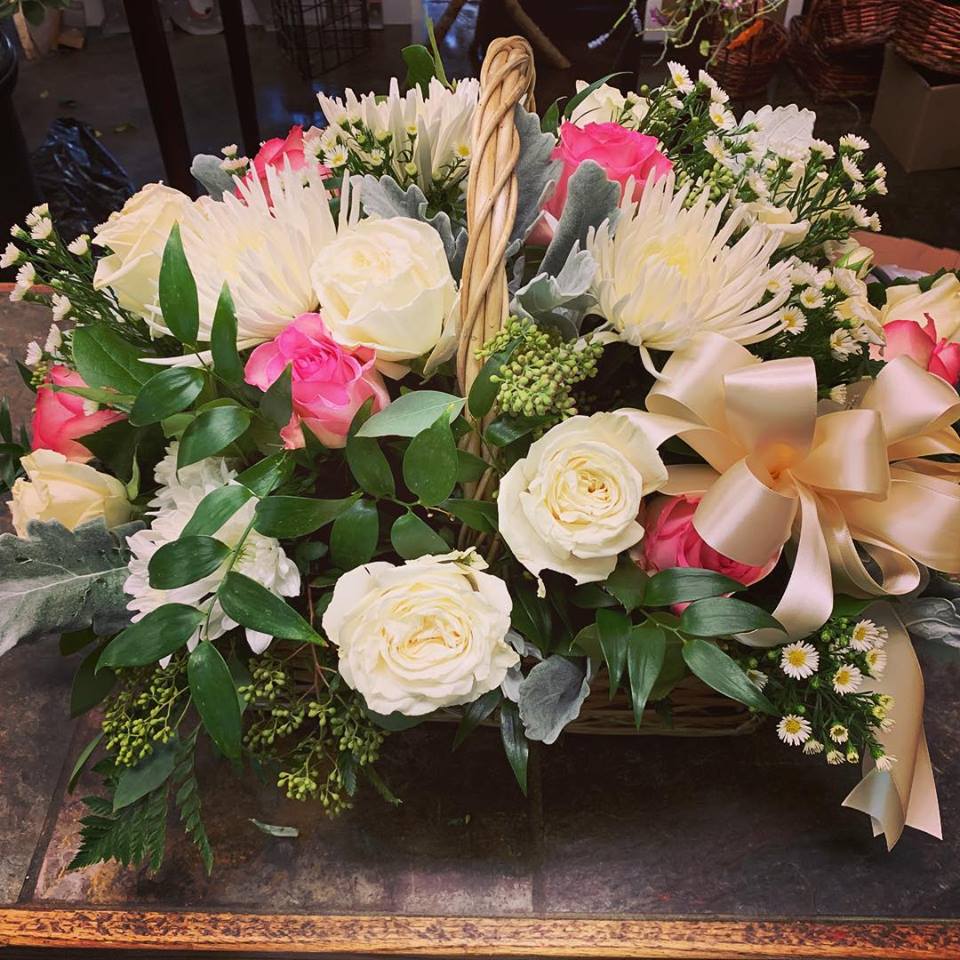 White and Pink Basket Sprays - This Basket Spray has White Roses, Creme Spray Roses, Pink Roses, White Fuji Mum's, White Monte Casino, Mixed Greenery, and a Double Satin Bow.